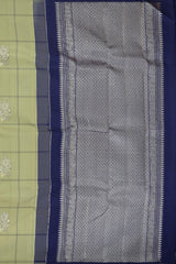 Sublime Harmony: Elaichi Green Pure Silk Saree with Navy Blue Elephant Motifs