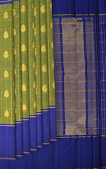 The Verdant Charm of Olive Green Kancheevaram Silk Saree with Mango and Iruthala Pakshi Motifs