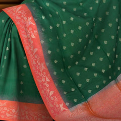 Enchantment in Green with Silver Buttas and Orange Borders Pure Silk Saree