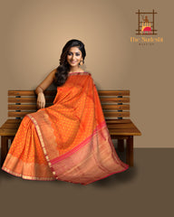 Sunset Orange Kanchipuram Silk Saree with Bhutta and Wave Border – A Radiant Classic