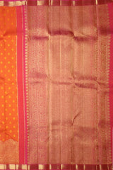 Sunset Orange Kanchipuram Silk Saree with Bhutta and Wave Border – A Radiant Classic