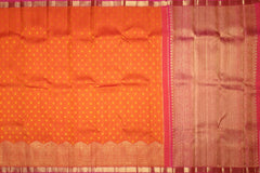 Sunset Orange Kanchipuram Silk Saree with Bhutta and Wave Border – A Radiant Classic