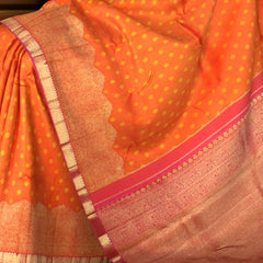 Sunset Orange Kanchipuram Silk Saree with Bhutta and Wave Border – A Radiant Classic