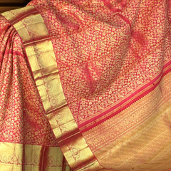 Red Kanchipuram Silk Saree with Zari Floral and Parrot Brocade – A Statement of Tradition and Festivity