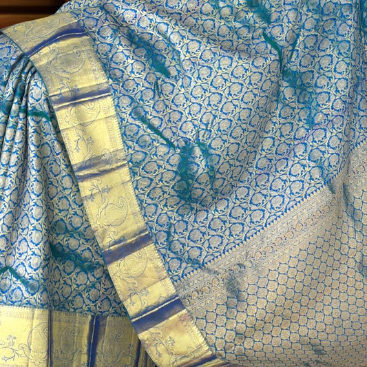 Peacock Green Kanchipuram Silk Saree with Floral Brocade – Nature-Inspired Grandeur in Every Thread