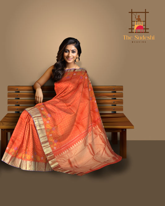 Orange Kanchipuram Silk Saree with Butta Jacquard and Floral Border – A Festive Symphony in Silk