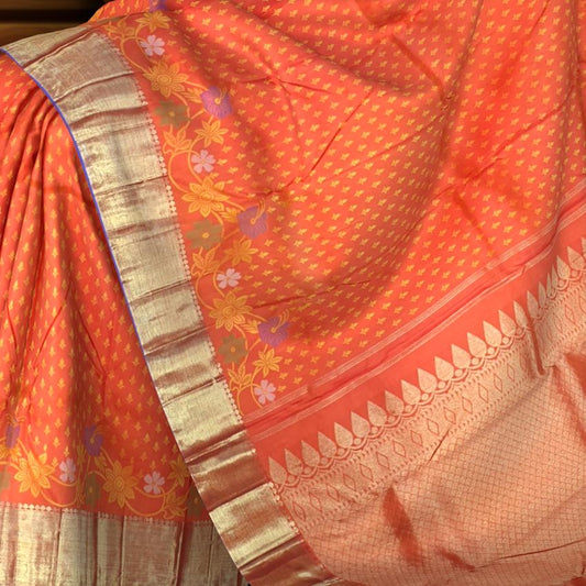 Orange Kanchipuram Silk Saree with Butta Jacquard and Floral Border – A Festive Symphony in Silk