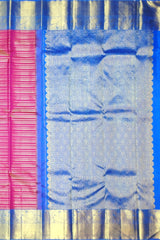 Bright Pink Kanchipuram Silk Saree with Horizontal Stripes and Royal Blue Veldhari Border – Bold, Bright, and Beautiful