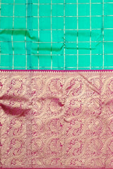 Sea Green Kanchipuram Silk Saree with Long Floral Wave Design Border – Nature-Inspired Elegance in Every Drape