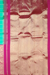 Sea Green Kanchipuram Silk Saree with Long Floral Wave Design Border – Nature-Inspired Elegance in Every Drape