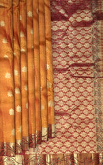 Rust Orange Kanchipuram Silk Saree with Red Floral Jacquard – A Fiery Expression of Tradition and Elegance