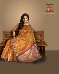 Rust Orange Kanchipuram Silk Saree with Red Floral Jacquard – A Fiery Expression of Tradition and Elegance