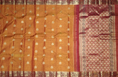 Rust Orange Kanchipuram Silk Saree with Red Floral Jacquard – A Fiery Expression of Tradition and Elegance