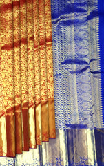 Red Kanchipuram Silk Saree with Royal Blue Elephant and Floral Jaquard
