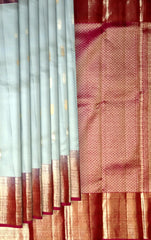 Steel Grey Kanchipuram Silk Saree with Silver and Gold Bhuttas and Terracotta Border