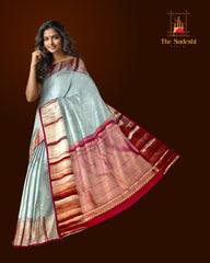 Steel Grey Kanchipuram Silk Saree with Silver and Gold Bhuttas and Terracotta Border