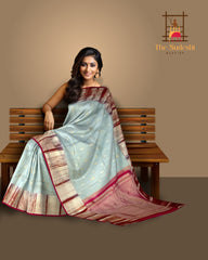 Steel Grey Kanchipuram Silk Saree with Silver and Gold Bhuttas and Terracotta Border