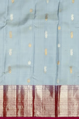 Steel Grey Kanchipuram Silk Saree with Silver and Gold Bhuttas and Terracotta Border