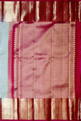 Steel Grey Kanchipuram Silk Saree with Silver and Gold Bhuttas and Terracotta Border
