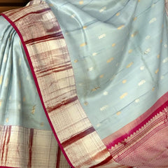 Steel Grey Kanchipuram Silk Saree with Silver and Gold Bhuttas and Terracotta Border