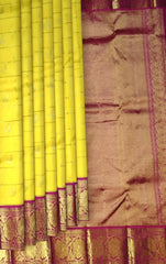 Yellow Checks with Peacock Motif Kanchipuram Silk Saree with Red Accents