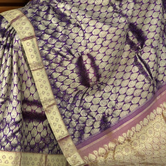 Purple Kanchi Pure Silk Saree with Tear Shape Jacquard and Reddish Pink Blouse – A Delicate Dance of Grace and Grandeur
