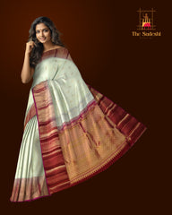 Light Beige Tear Bhutta Kanchipuram Silk Saree with Blue and Copper Accents