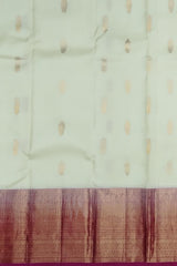 Light Beige Tear Bhutta Kanchipuram Silk Saree with Blue and Copper Accents