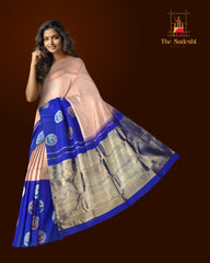 Light Pink Kanchi Pure Silk Saree with Royal Blue Border and Silver-Gold Circle Bhuttas – Subtle Elegance with a Regal Edge
