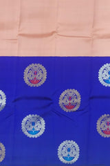 Light Pink Kanchi Pure Silk Saree with Royal Blue Border and Silver-Gold Circle Bhuttas – Subtle Elegance with a Regal Edge
