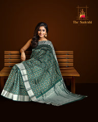 Dark Green Kanchi Pure Silk Saree with Silver Checks and Annam Chakram Butta – A Regal Tribute to Tradition
