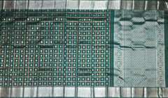 Dark Green Kanchi Pure Silk Saree with Silver Checks and Annam Chakram Butta – A Regal Tribute to Tradition