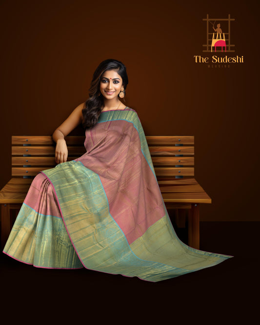 Pink Kanchipuram Silk Saree with checks, tissue, and pink podi kattam designs on the body with powder blue contrast border featuring benarspet with round motif and diamond butta design in pallu