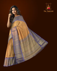 Light Orange Kanchipuram Silk Saree with large diamond motif design on the body with lavender contrast border featuring varusai pet border and annam, small diamond designs in pallu