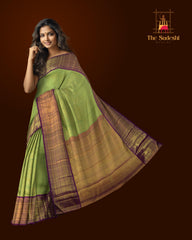 Lime Green Kanchipuram jacquard Silk Saree with intricately designed patterns on the body with wine purple vaada malli contrast border and peacock, diamond designs in pallu