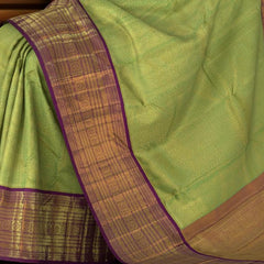 Lime Green Kanchipuram jacquard Silk Saree with intricately designed patterns on the body with wine purple vaada malli contrast border and peacock, diamond designs in pallu