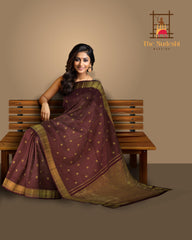 Coffee Brown Kanchipuram Silk Saree with checks and podi zari kattam with kamalam butta designs on the body with self kuyil kann with kolam design border and floral with diamond design and hexagon varisapet designs in pallu