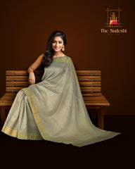 Light Lavender Kanchipuram Silk Saree with intricate diamond butta design on the body with self floral with cross lines border and grand diamond design pallu