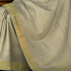 Light Lavender Kanchipuram Silk Saree with intricate diamond butta design on the body with self floral with cross lines border and grand diamond design pallu