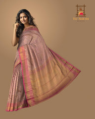 Baby Pink Kanchipuram jacquard Silk Saree with embossed and brocade designs on the body with dark candy pink contrast border and rich grand intricately designed pallu