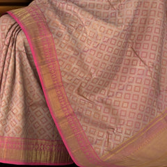 Baby Pink Kanchipuram jacquard Silk Saree with embossed and brocade designs on the body with dark candy pink contrast border and rich grand intricately designed pallu