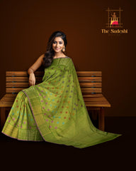 Lime green Kanchipuram Silk Saree with Tissue, Embossed, Meenakari, Diamond design with multicolour threadwork on the body with light green with lavender selvage contrast border and pallu featuring grand, floral intricately designed grand pallu
