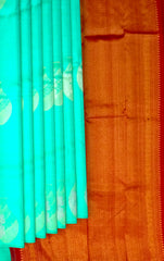 Mesmerizing Turquoise Blue Kanchipuram Silk Saree with Borderless Motifs