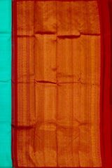 Mesmerizing Turquoise Blue Kanchipuram Silk Saree with Borderless Motifs