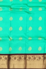 Sea Green Kanchipuram Silk Saree with Coffee Brown Border and Bhutta Design
