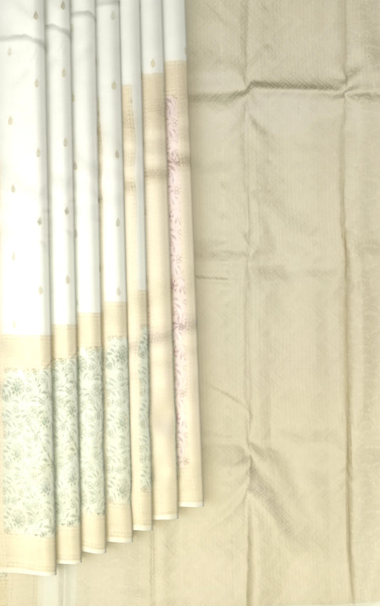 Offwhite Kanchipuram Silk Saree with Meenakari Floral Border and Tear-Shaped Bhuttas