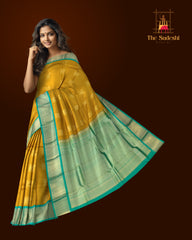 Luminous Yellow Kanchipuram Silk Saree with Elegant Bhuttas - Vibrant Traditions