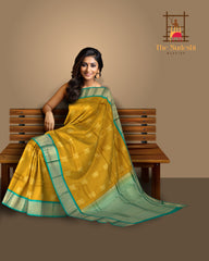 Luminous Yellow Kanchipuram Silk Saree with Elegant Bhuttas - Vibrant Traditions