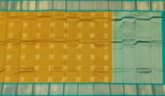 Luminous Yellow Kanchipuram Silk Saree with Elegant Bhuttas - Vibrant Traditions