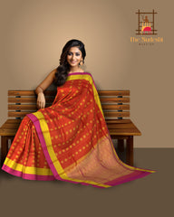 Rustic Orange Kanchipuram Silk Saree with Elegant Bhuttas & Pink Accents - Warm Radiance